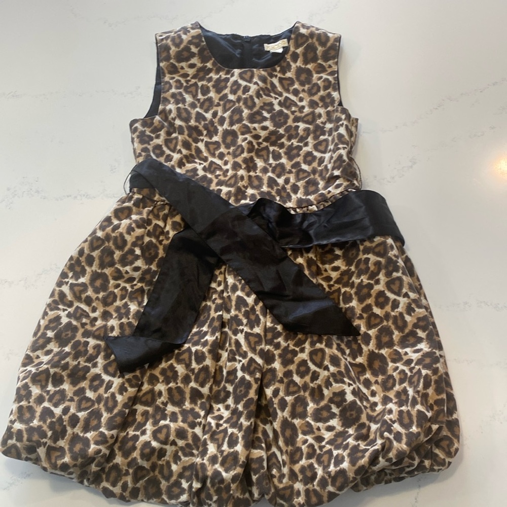 Beautiful leopard print, lined party dress. Girls size 6X/7